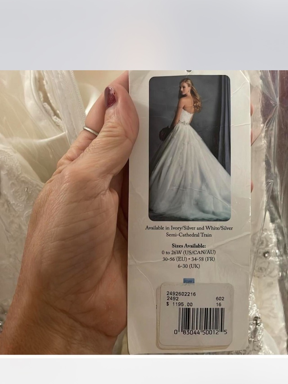 Strapless White Ball Gown Wedding Dress - Picture 6 of 7